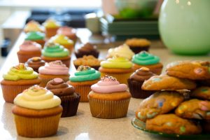 Cupcakes and cookies for a holiday market bake sale